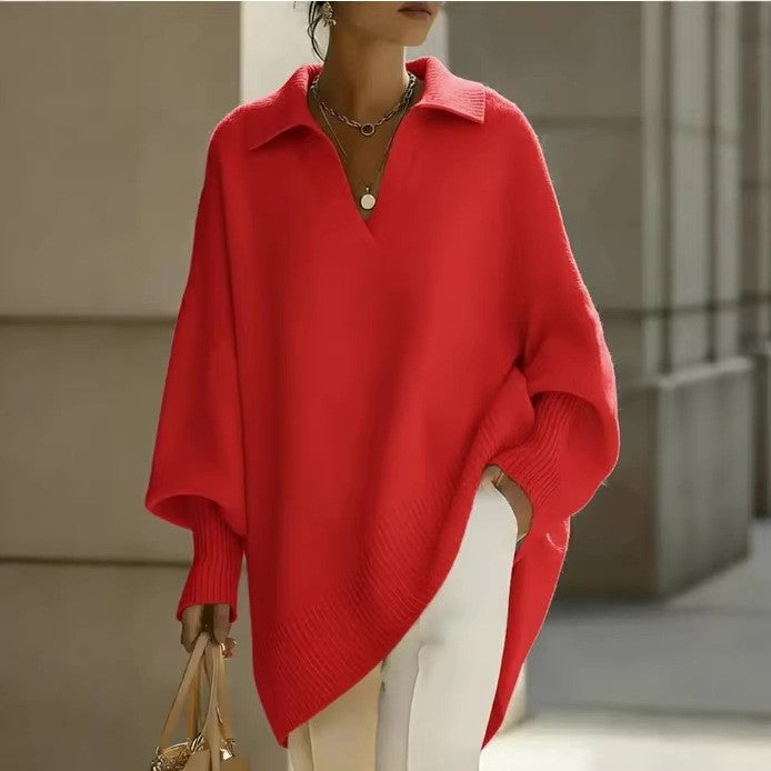 Person wearing a red poncho with a blurred background