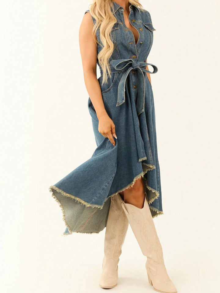 Denim dress with a belt worn by a person on a white background