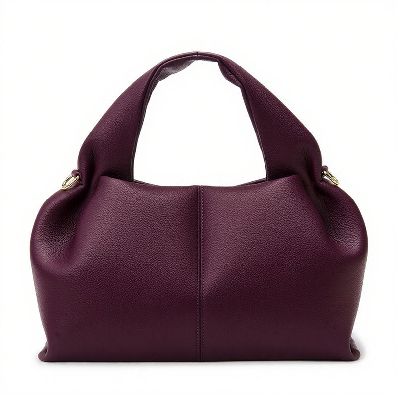 Purple handbag on a white background