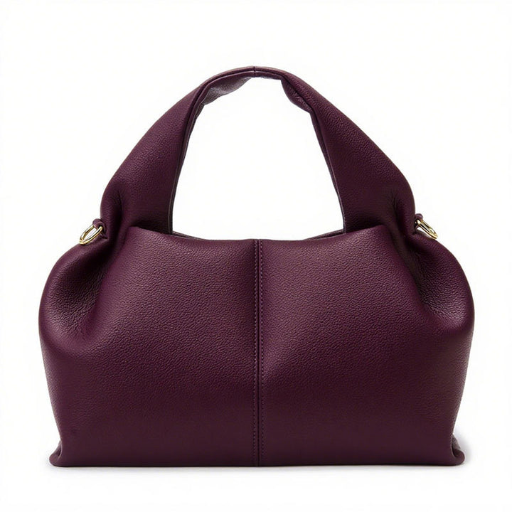 Purple handbag on a white background