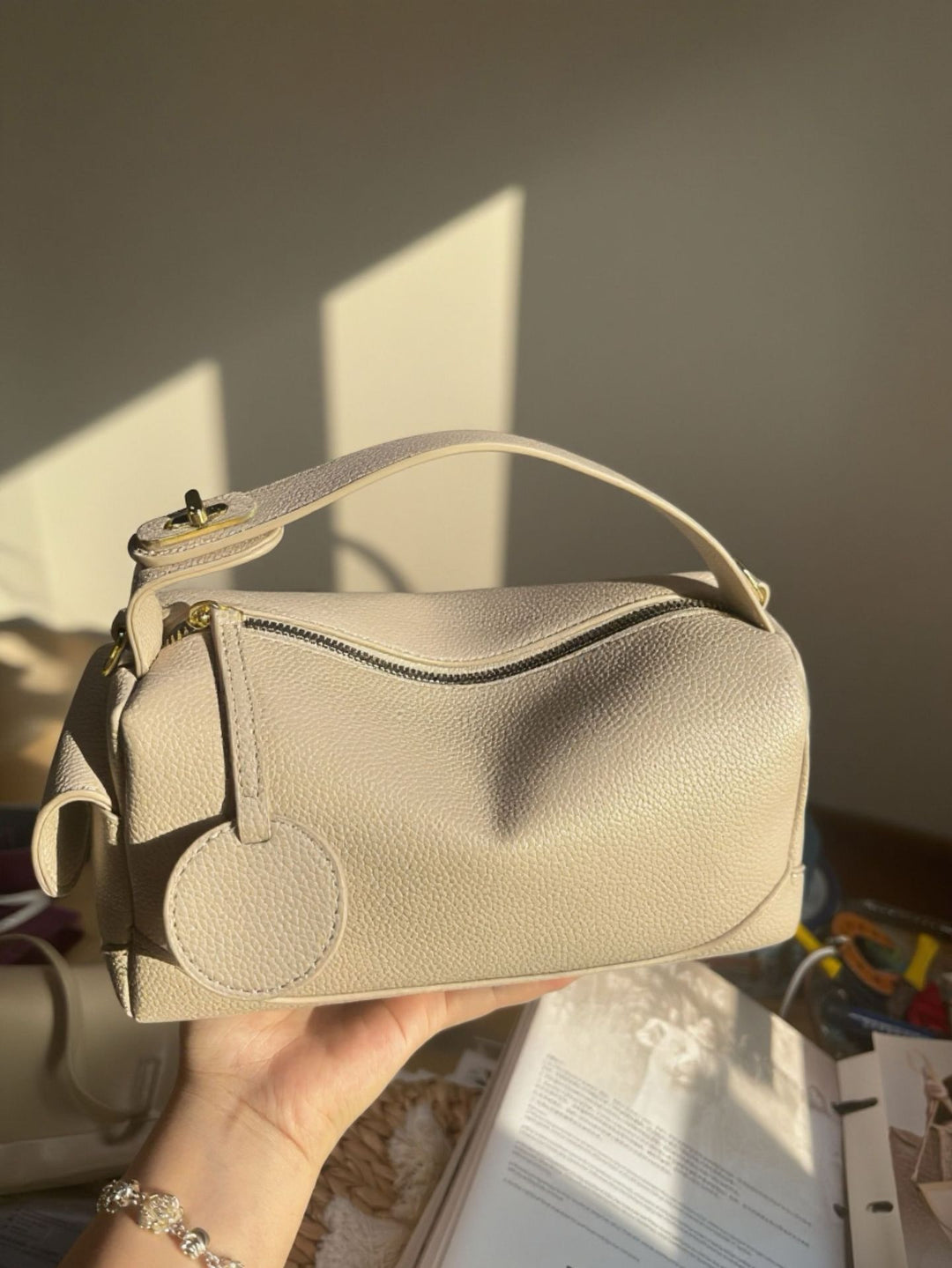 Soft PU leather Pillow bag with urban minimalist aesthetic