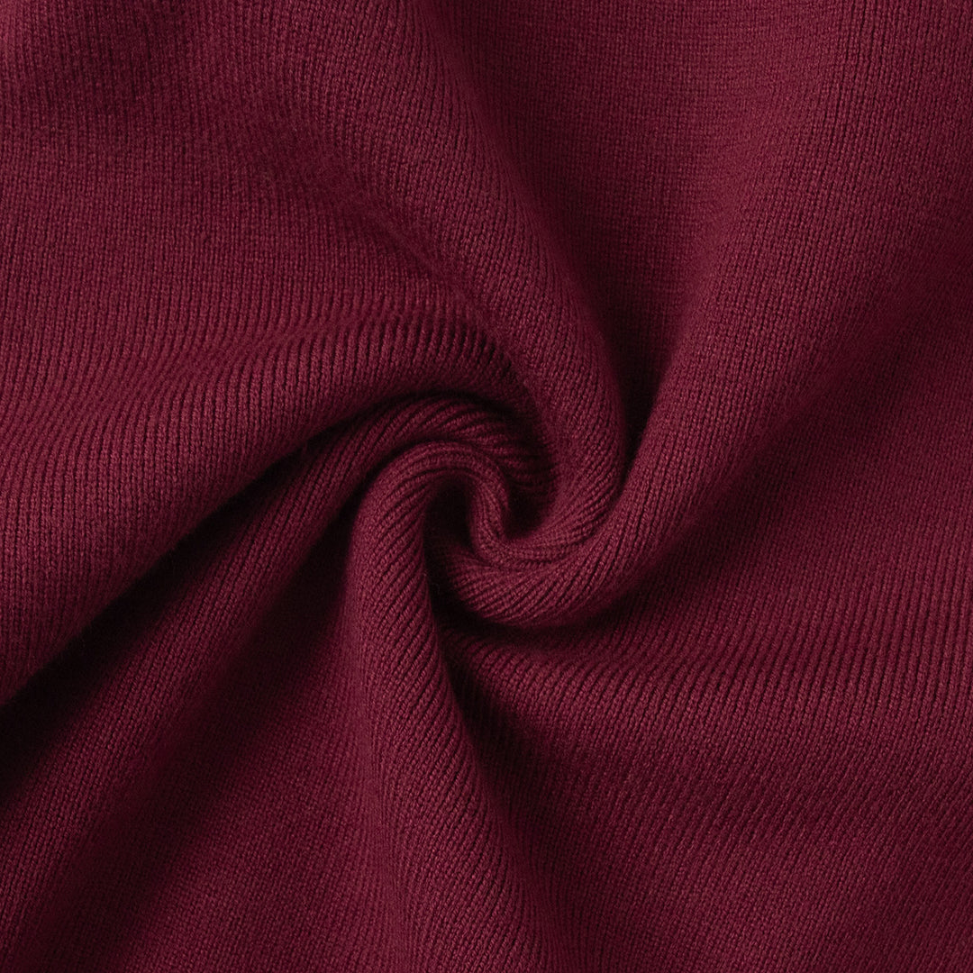 Close-up of burgundy fabric with a visible texture