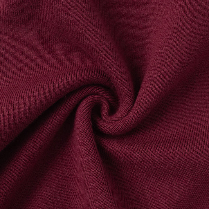 Close-up of burgundy fabric with a visible texture